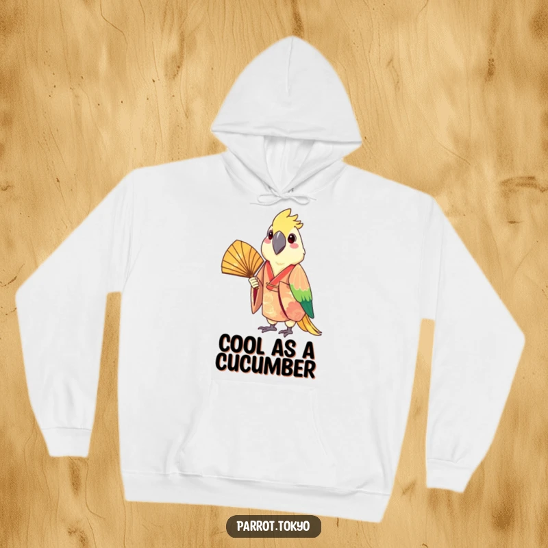 Funny hoodie featuring a cheerful parrot in a festive kimono, elegantly holding a fan, symbolizing warmth and playful spirit.